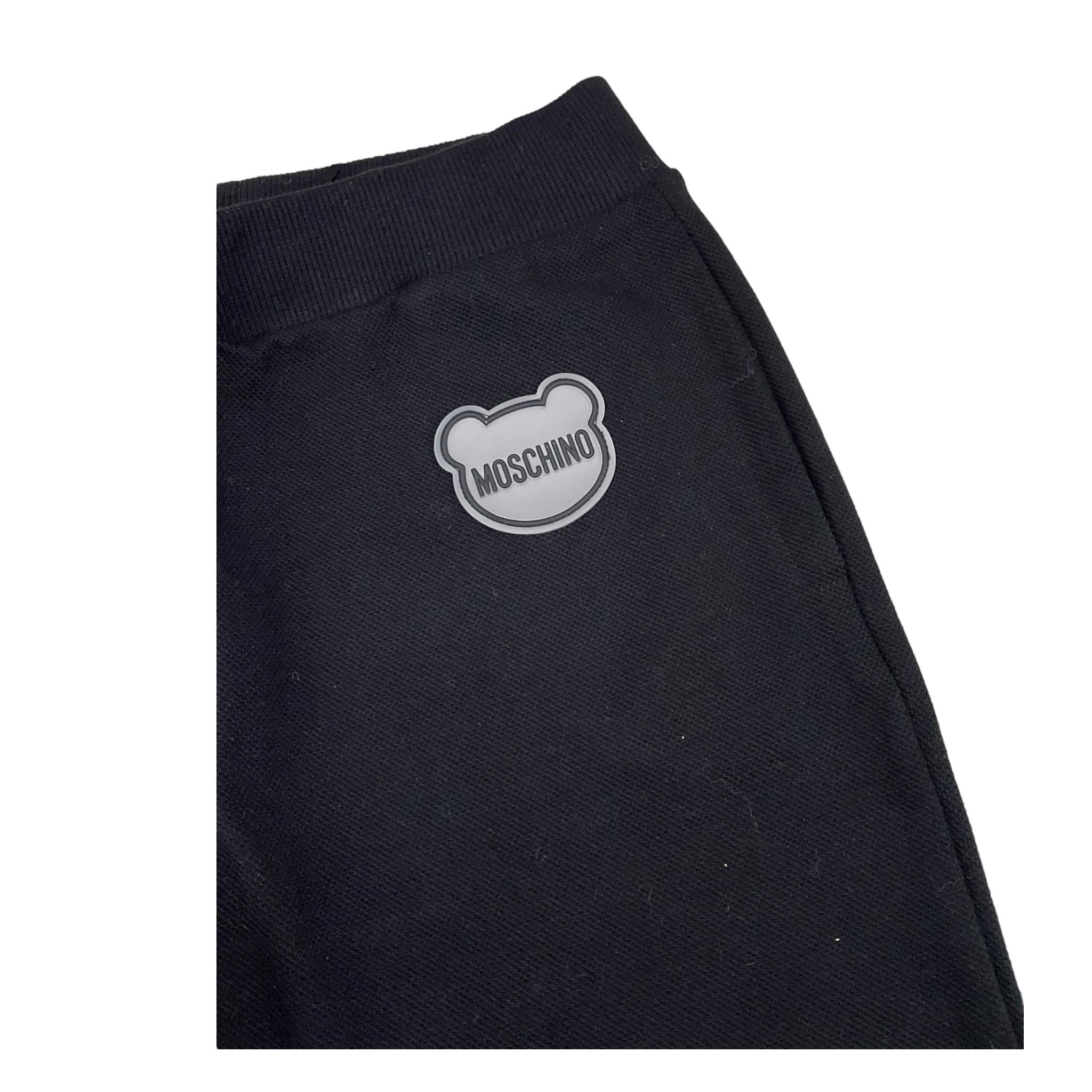 MOSCHINO pantalone tuta tinta unita con logo Nero per Bambino HUP085L NERO MOSCHINO
