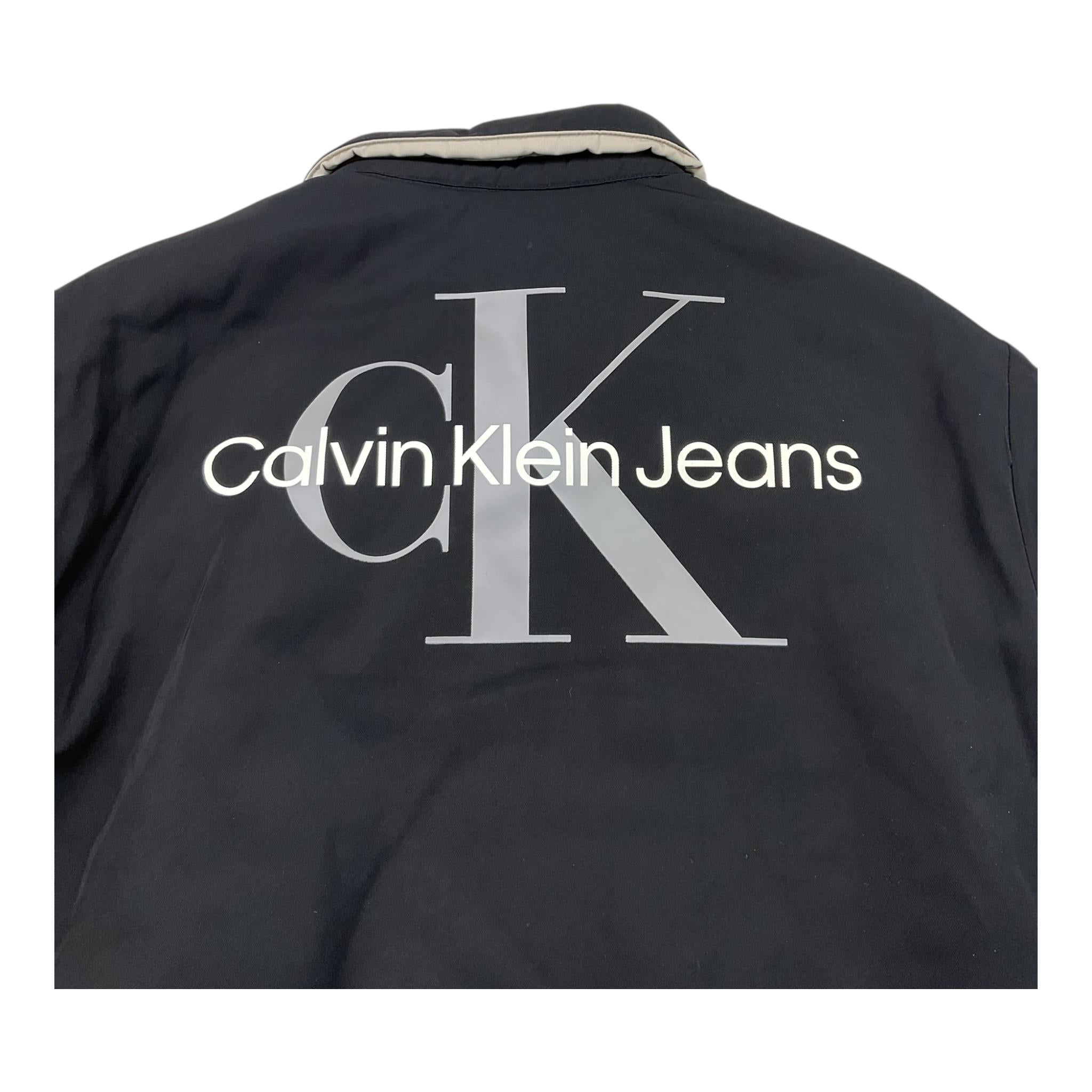 CALVIN KLEIN giubbino tinta unita con colletto e bottoni e logo reversibile Nero/beige per Bambino I0IU00541 NERO/BEIGE CALVIN KLEIN