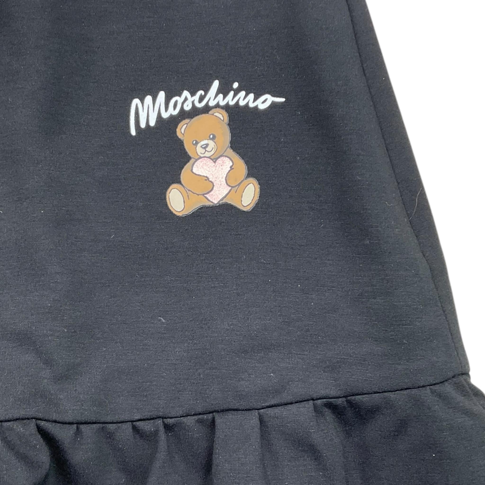 MOSCHINO gonna tinta unita con logo Nero per Bambina HDJ03W NERO MOSCHINO