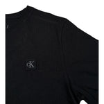 Calvin Klein T-Shirt Girocollo tinta unita con Logo Nero per Bambino IU0IU00543X NERO CALVIN KLEIN 