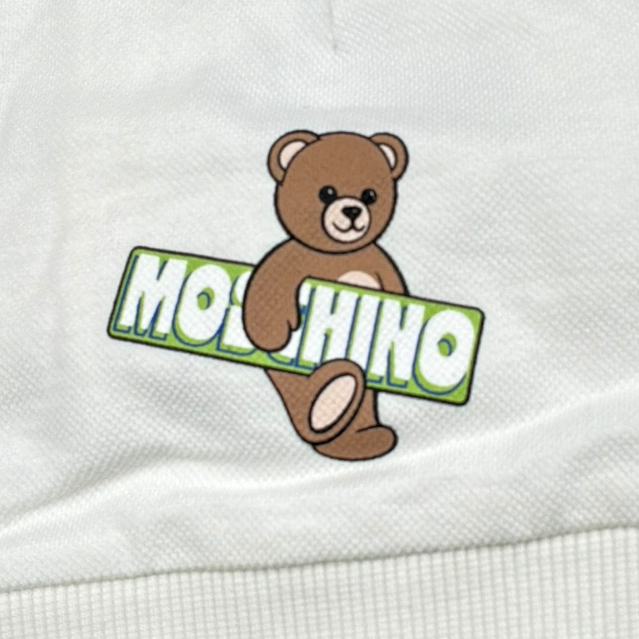 Moschino Cappello Tinta Unita con Stampa per Neonato MMY04Y BIANCO MOSCHINO 