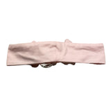 Das Eulen-Stirnband in Volltonfarbe mit rosa Applikation für Neugeborene