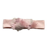 Das Eulen-Stirnband in Volltonfarbe mit rosa Applikation für Neugeborene